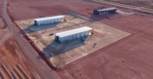 Aerial view of two industrial shop buildings on a 2.84-acre industrial site in Carlsbad, New Mexico