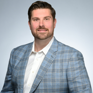 Portrait of Justin Dodd, founder and principal of 5 Arrows Group